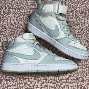 Light blue and white Nike high tops